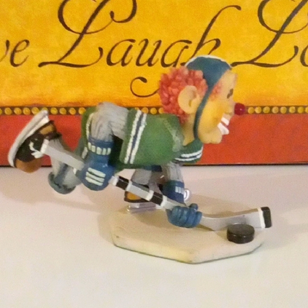 Vintage Hockey Playing Clown Decor